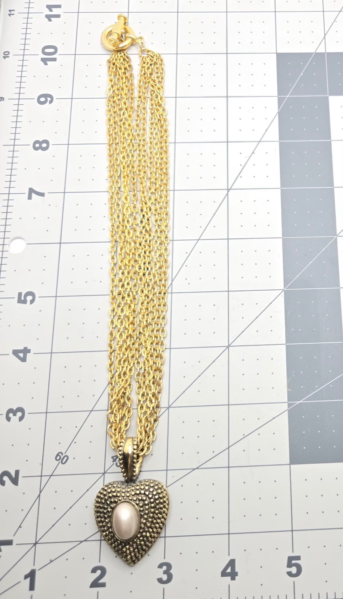 Vintage Gold-Tone Multi-Chain Necklace with Heart Pendant and Faux Pearl