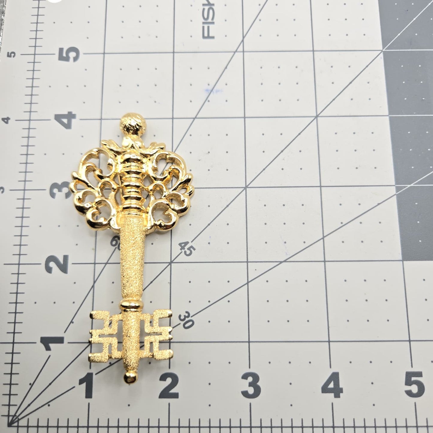 Vintage MONET signed large Key gold tone brooch pin