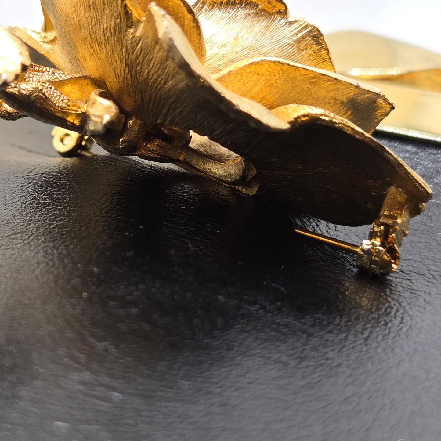 Vintage ETRA black leather clutch bag with ROSE Brooch pin and gold tone chain