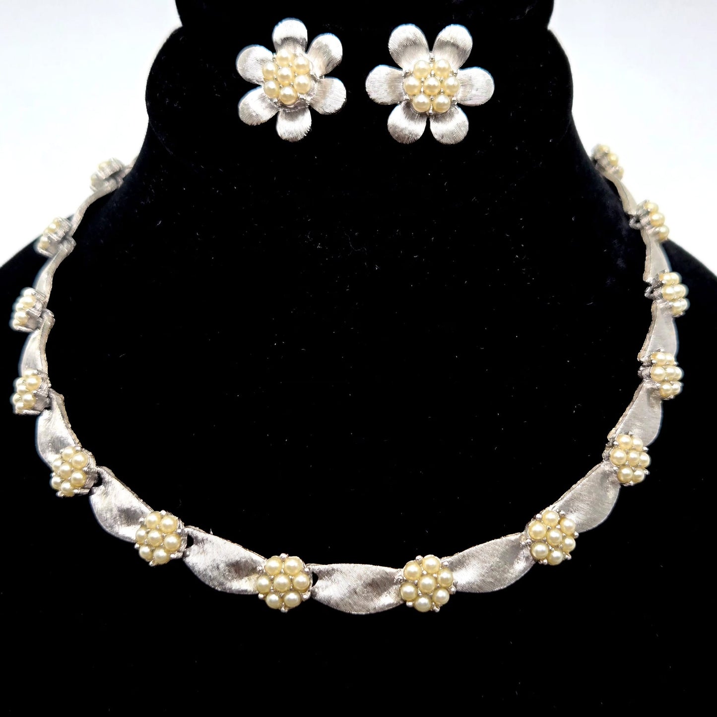 Vintage TRIFARI CROWN signed Ribbon Faux Pearls Brushed Silver tone Necklace and flower clip on earrings set