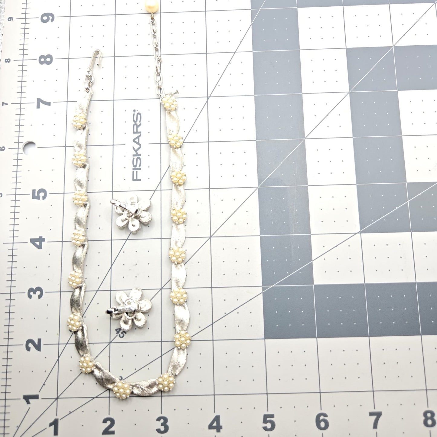 Vintage TRIFARI CROWN signed Ribbon Faux Pearls Brushed Silver tone Necklace and flower clip on earrings set