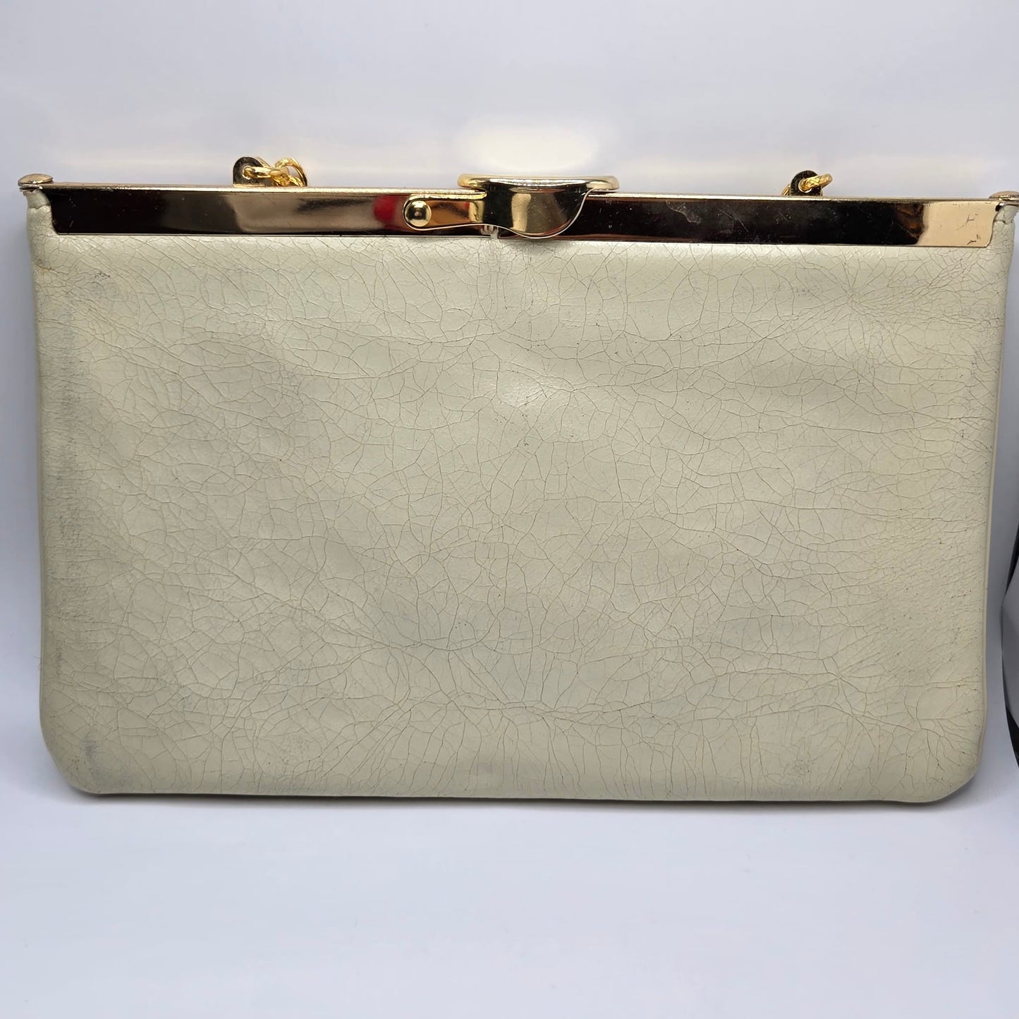Vintage cream leather clutch bag with MONET Fly Bug Brooch pin and gold tone chain