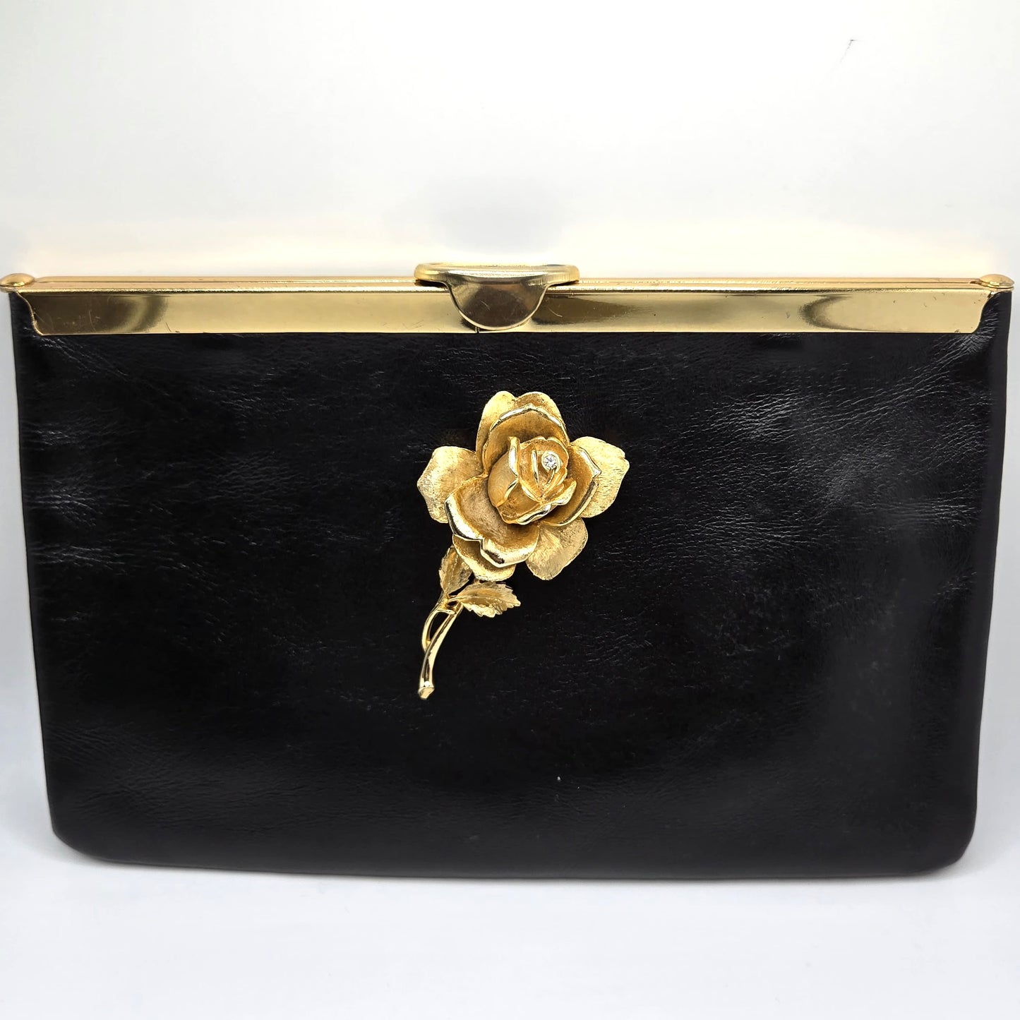 Vintage ETRA black leather clutch bag with ROSE Brooch pin and gold tone chain