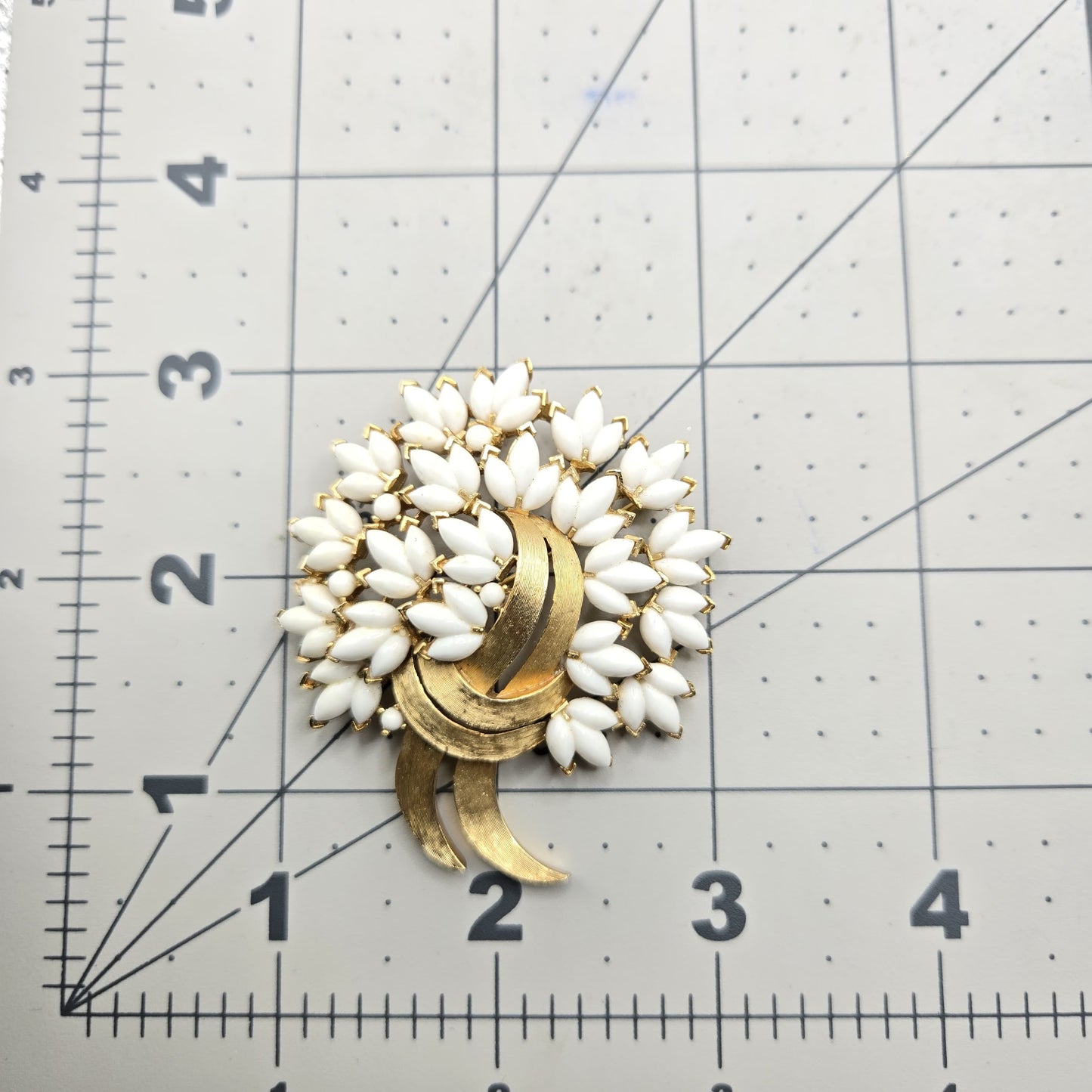 Vintage TRIFARI crown white milk glass flowers gold tone ribbon design Brooch pin