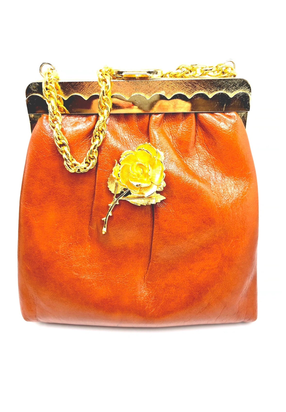 Vintage orange brown leather handbag with MONET Rose brooch pin and gold tone chain