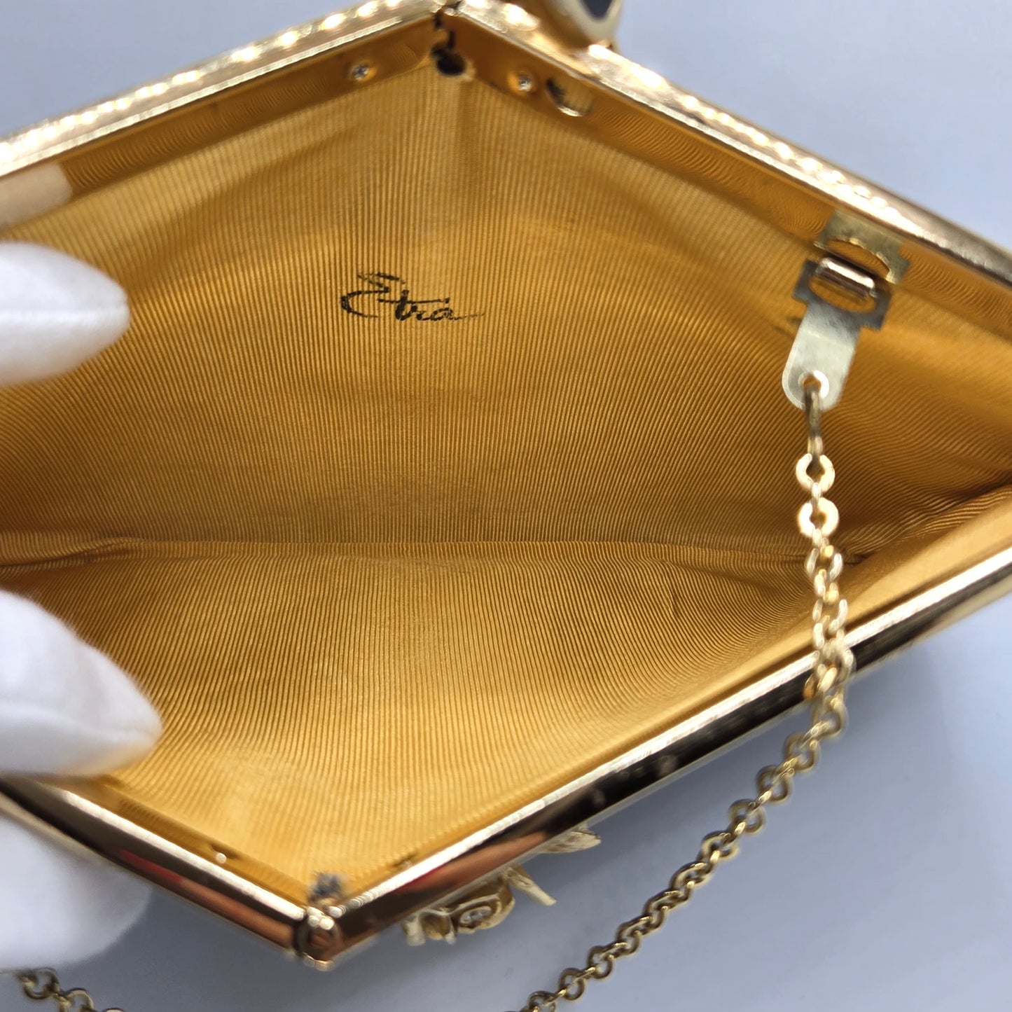 Vintage ETRA black leather clutch bag with ROSE Brooch pin and gold tone chain