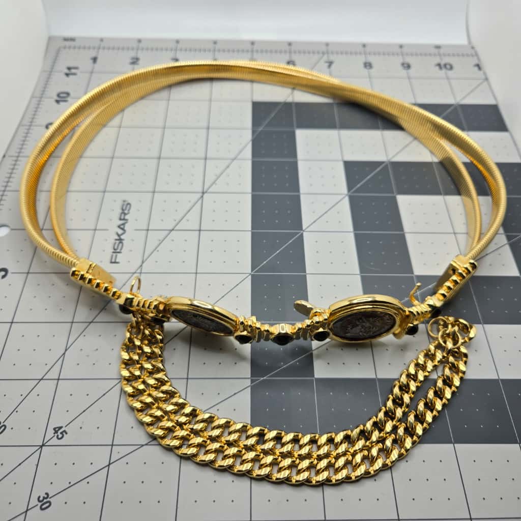 Vintage Judith Leiber Designer Runway Coin Embellished Stretch Belt gold tone. 25-28 inches