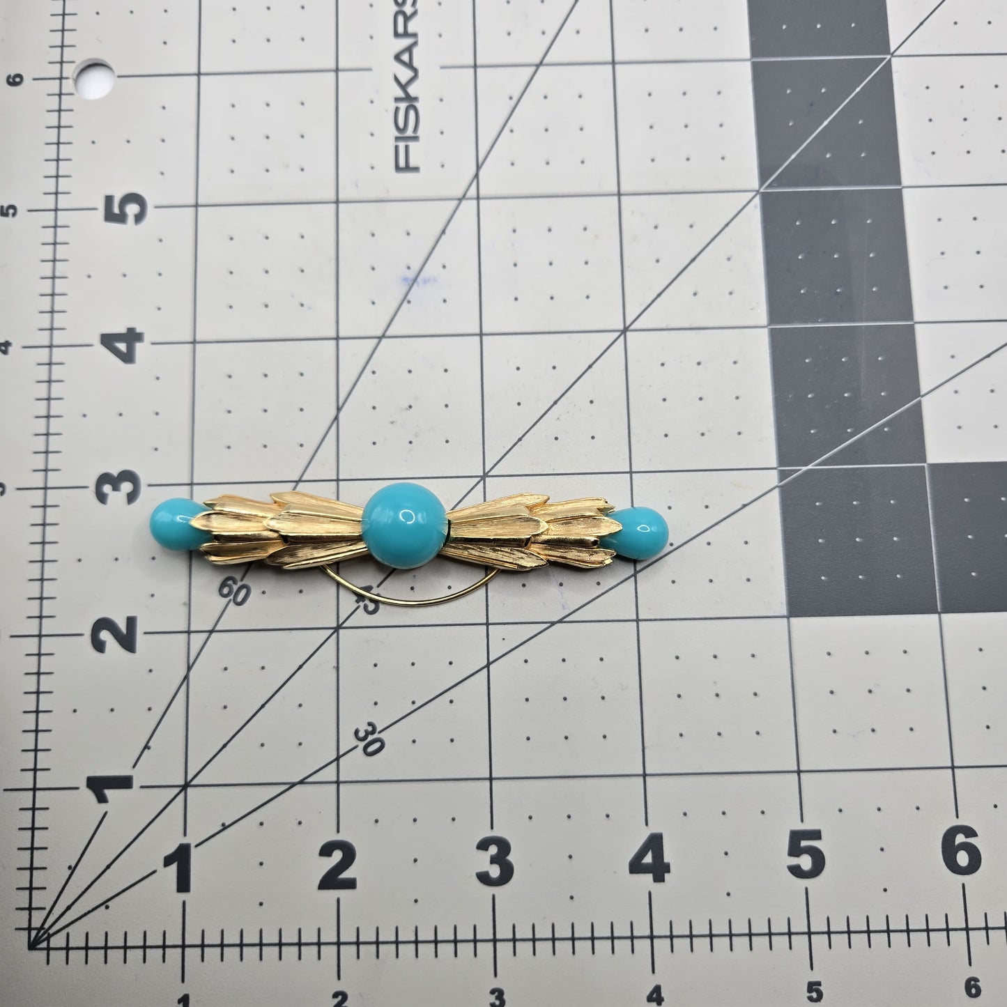 Vintage TRIFARI Faux turquoise gold tone brooch pin
