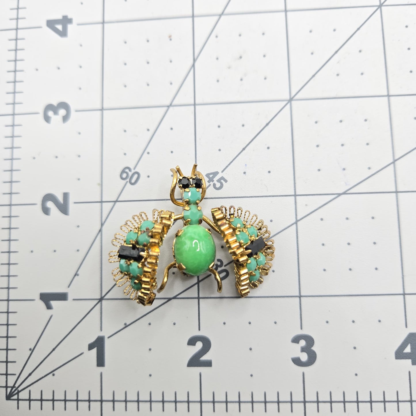 Vintage AUSTRIA Bug green black Cabochon gold tone brooch pin