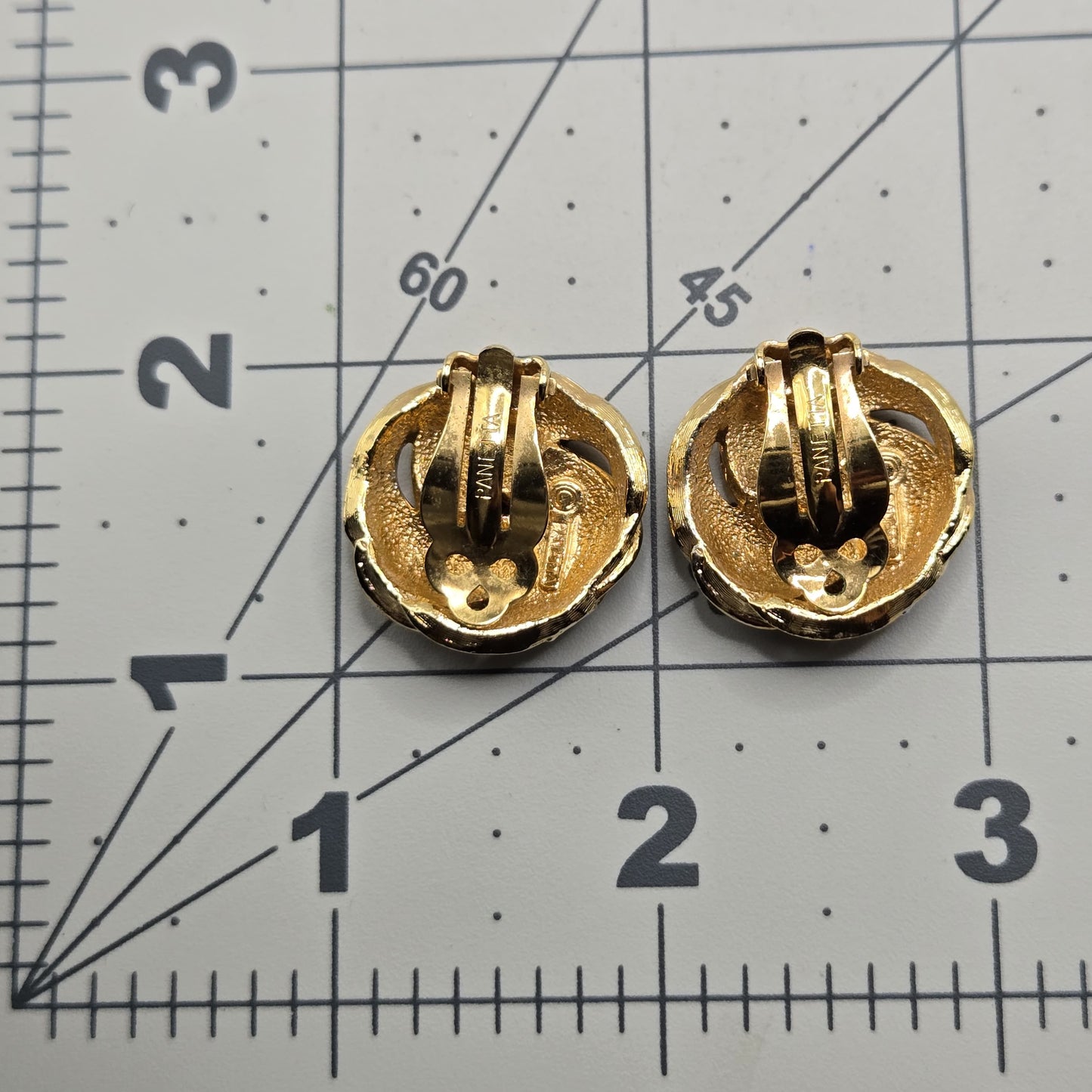 Vintage PANETTA Swirl green enamel rhinestones gold tone clip on earrings