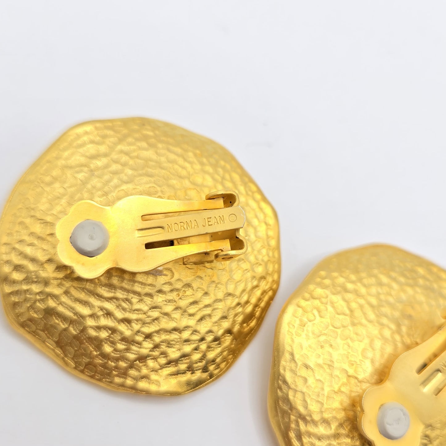 Vintage NORMA JEAN Large Modernist Round matte gold tone clear rhinestone designer runway clip on earrings