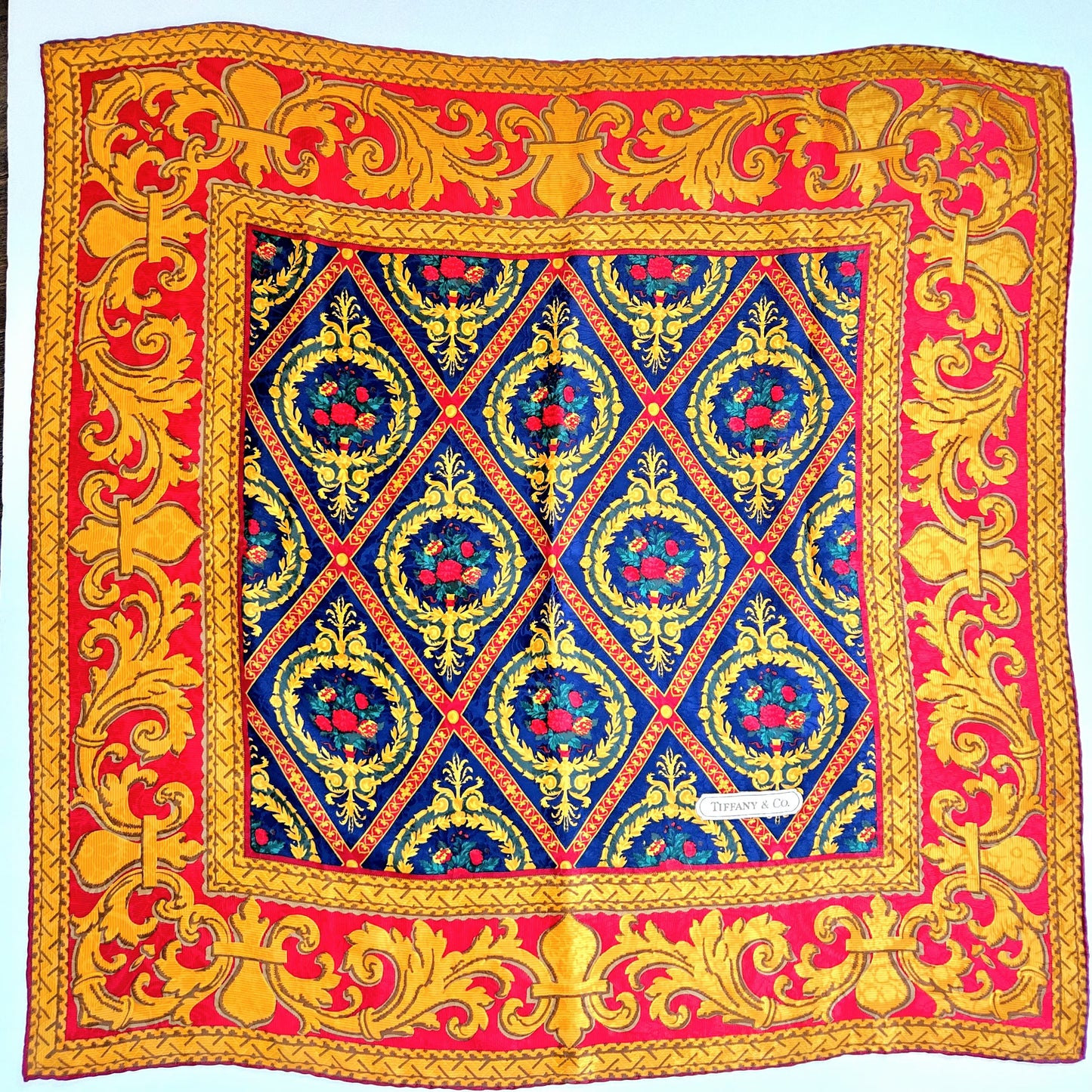 Vintage TIFFANY & CO. printed silk scarf blue, red, green and gold design with hand-rolled edges silk scarf 34x34