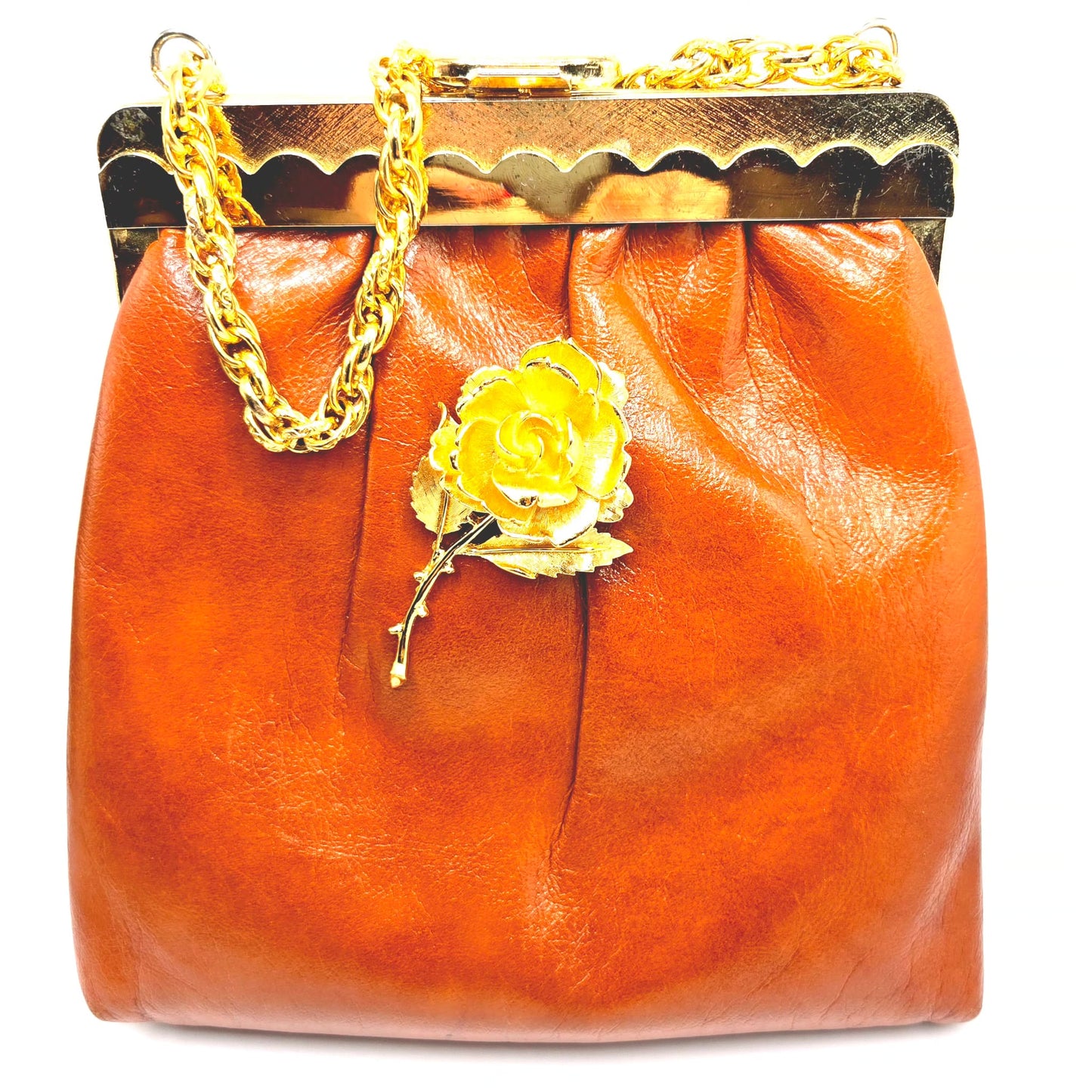 Vintage orange brown leather handbag with MONET Rose brooch pin and gold tone chain