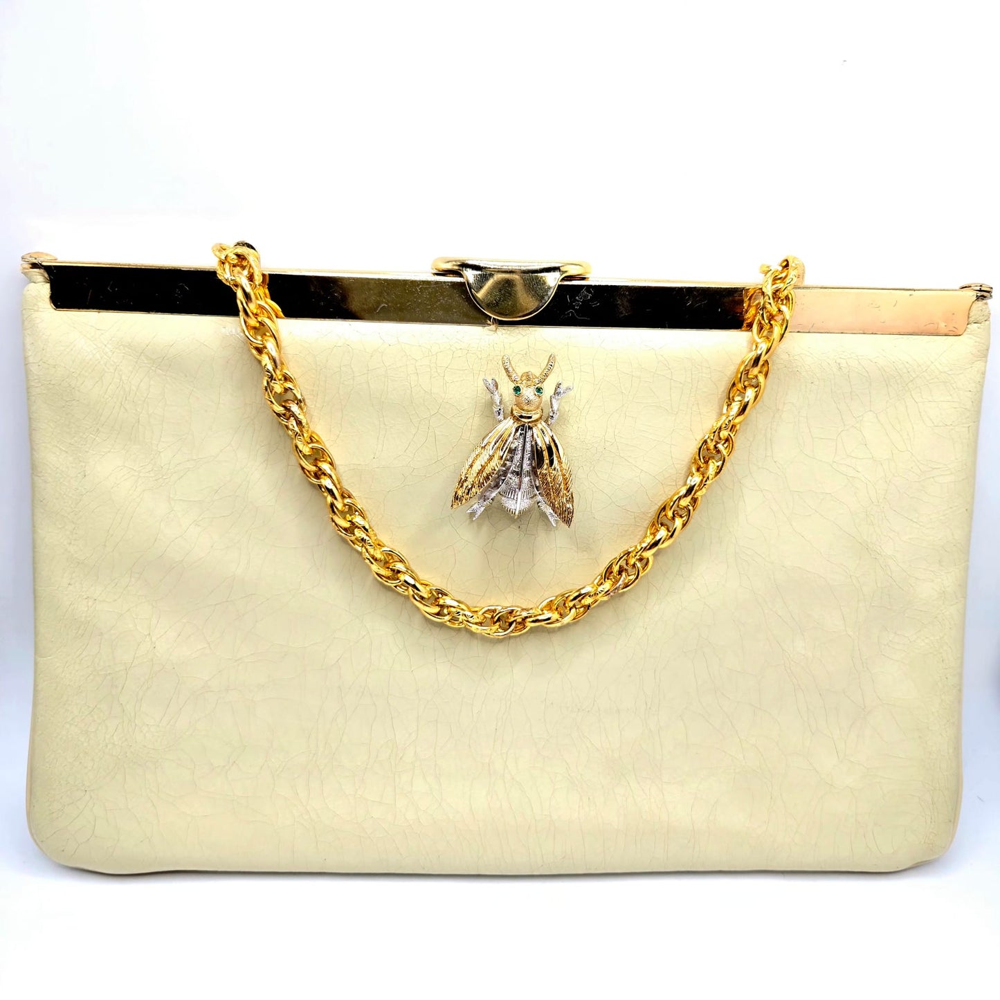 Vintage cream leather clutch bag with MONET Fly Bug Brooch pin and gold tone chain
