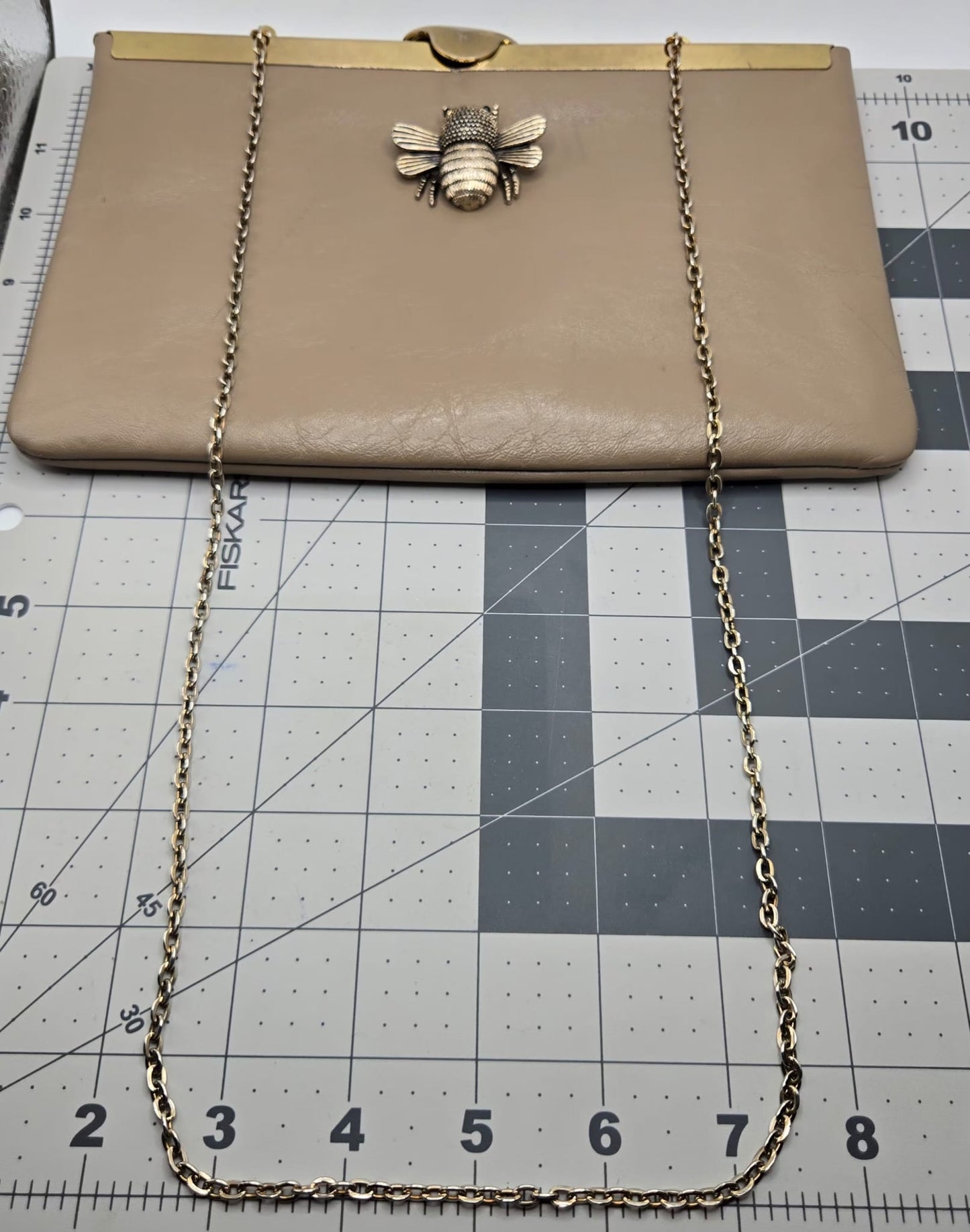 Vintage ETRA grey-brown leather clutch bag with antique silver shoulder chain and bee brooch pin