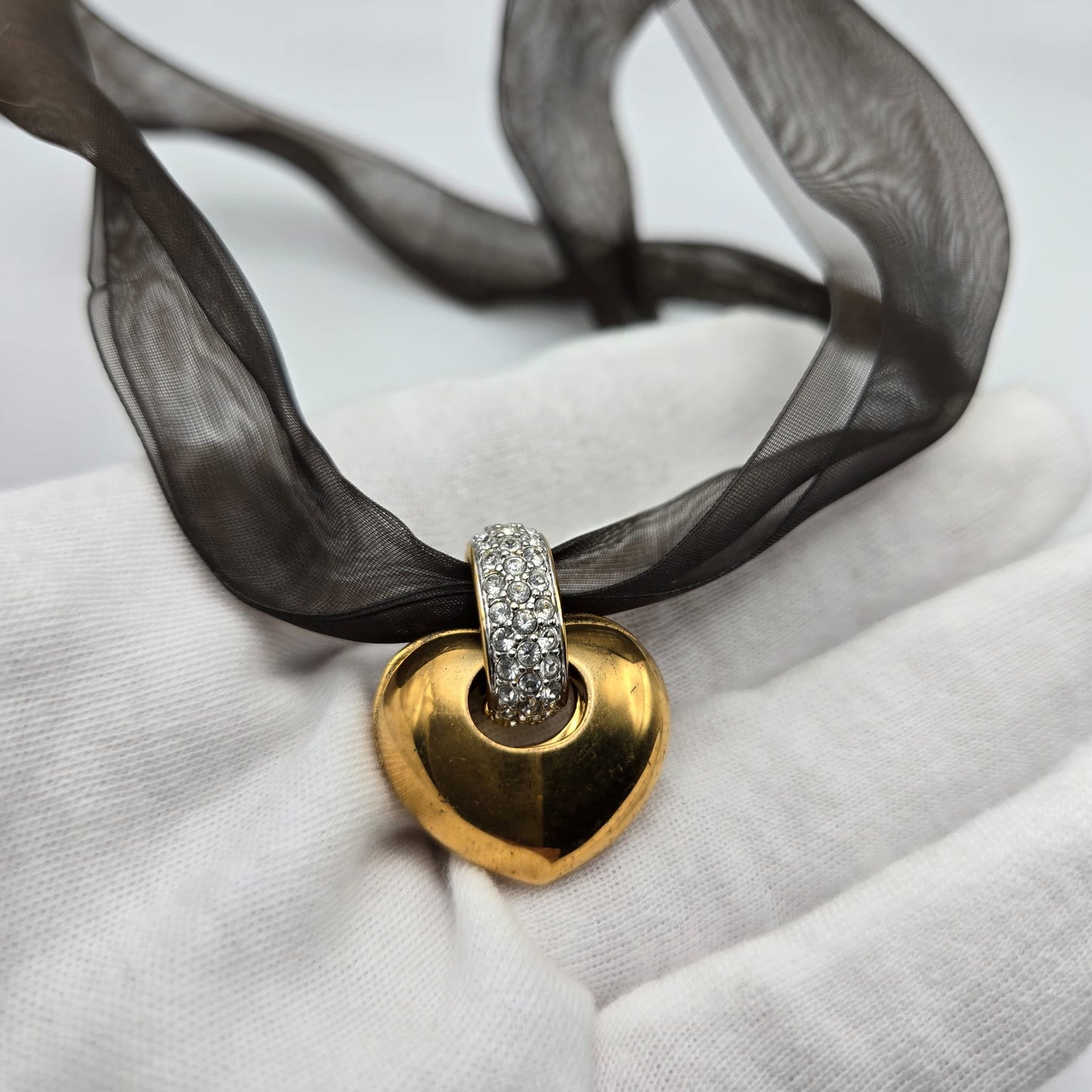 Vintage SWAROVSKI Swan Signed Gold Tone Pendant Necklace, Heart Splits Into Two with Red Crystal Heart Inside, Brown Ribbon