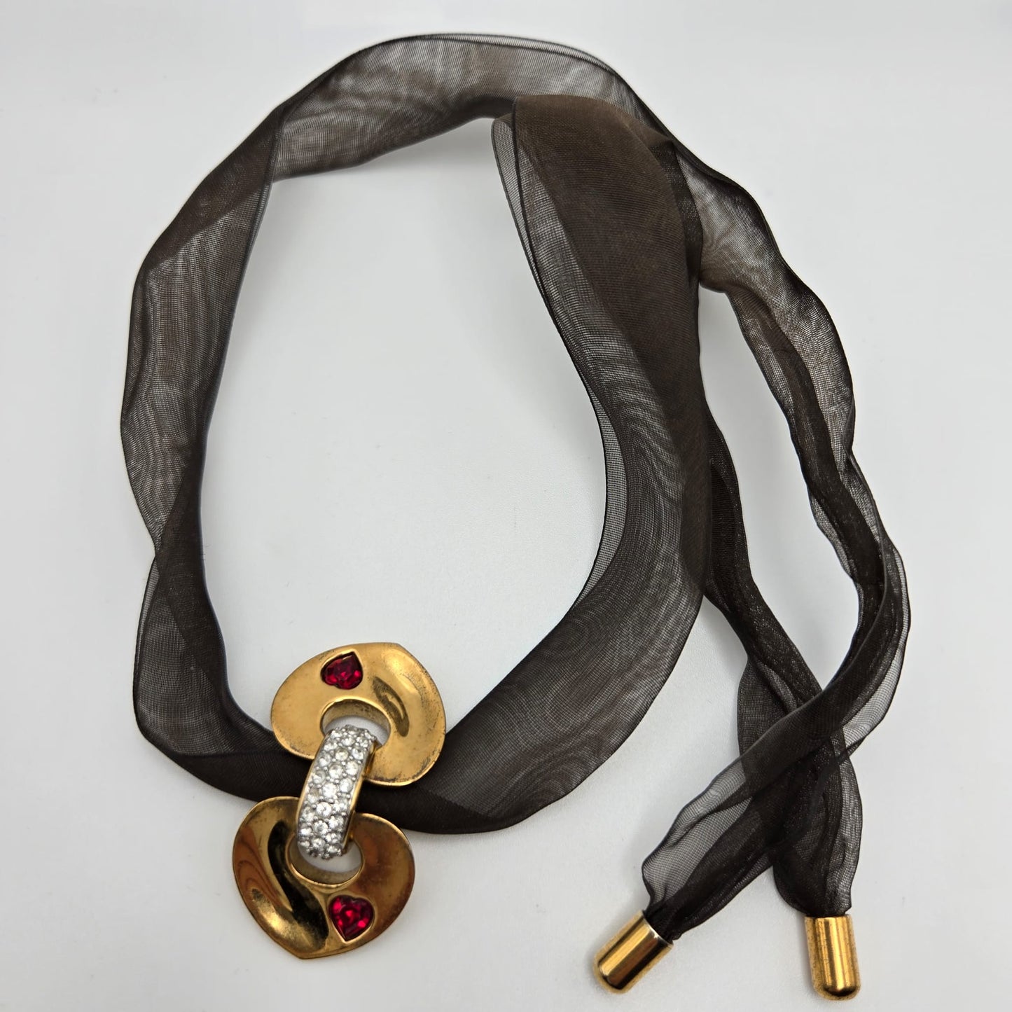 Vintage SWAROVSKI Swan Signed Gold Tone Pendant Necklace, Heart Splits Into Two with Red Crystal Heart Inside, Brown Ribbon