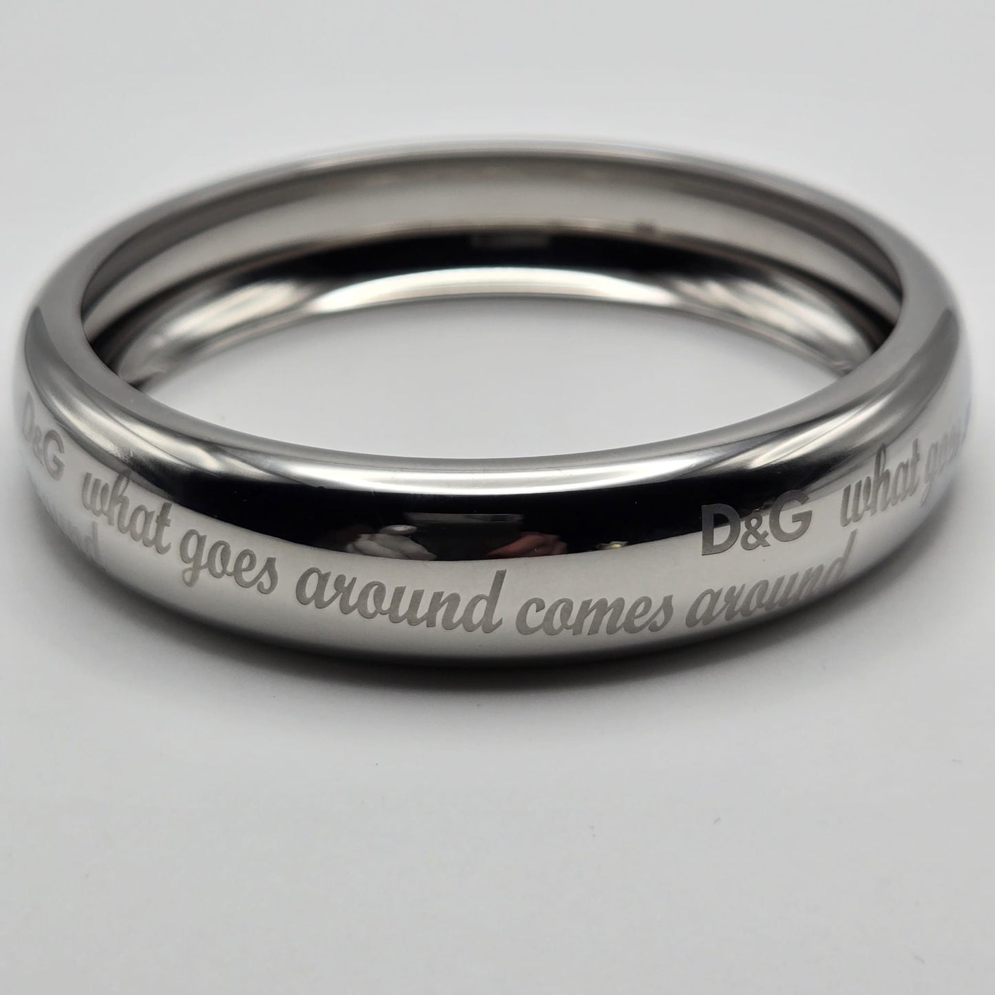 D&G DOLCE GABBANA What Goes Around Comes Around, Silver Tone Bangle Bracelet, Very Good Condition