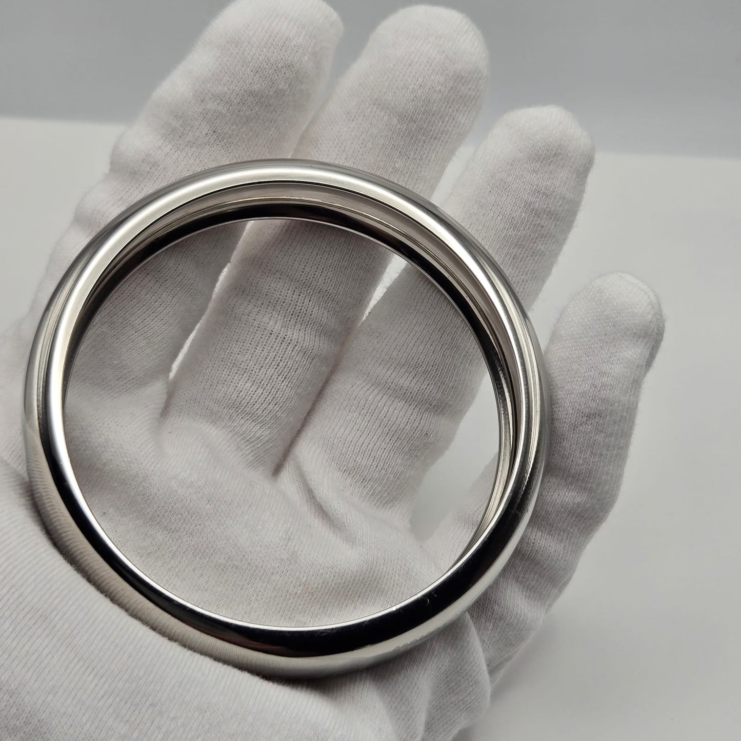 D&G DOLCE GABBANA What Goes Around Comes Around, Silver Tone Bangle Bracelet, Very Good Condition