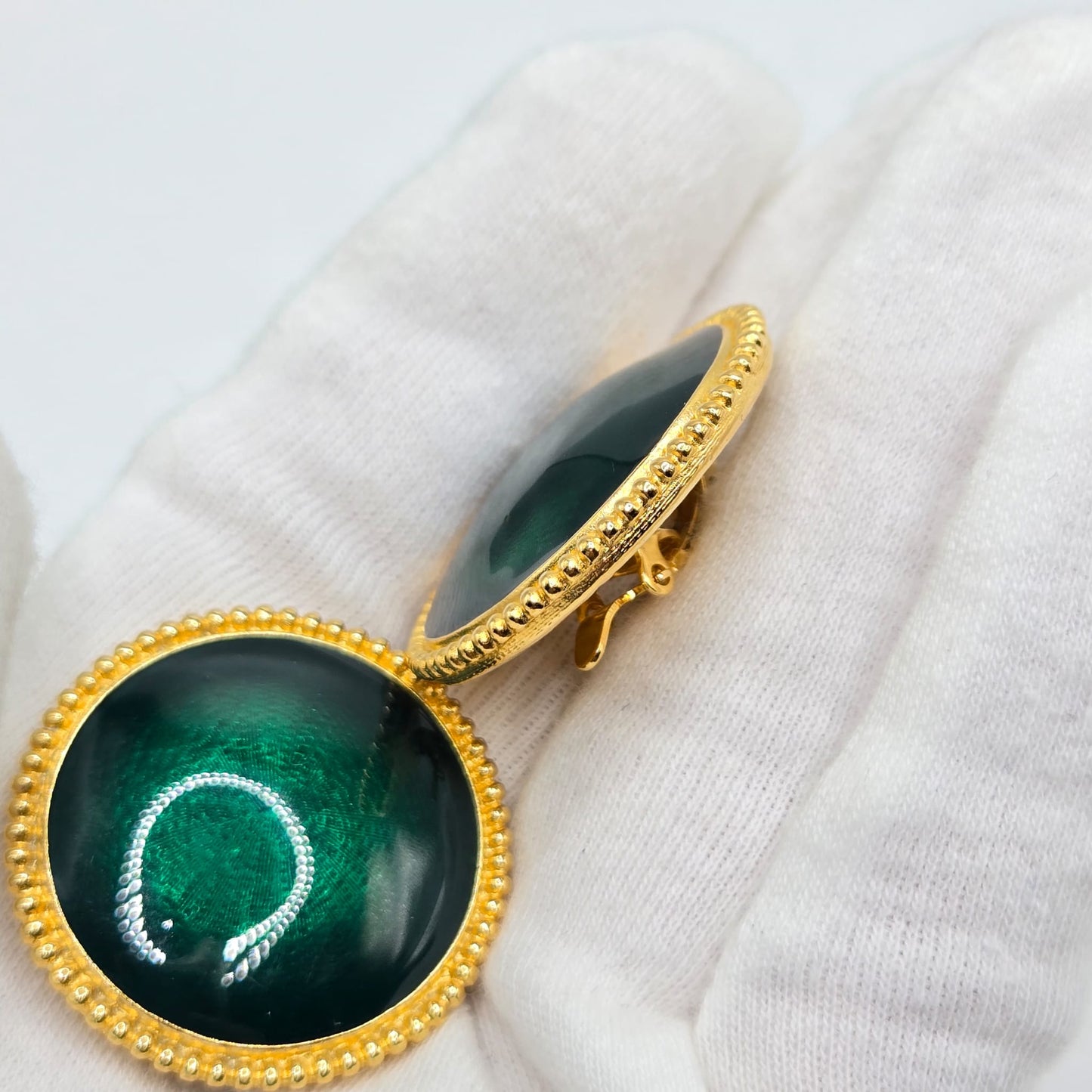 Vintage TRIFARI TM Large green enamel round gold tone clip on earrings